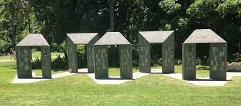 Five stone pillar structures in a park, Queensland Police Memorial.